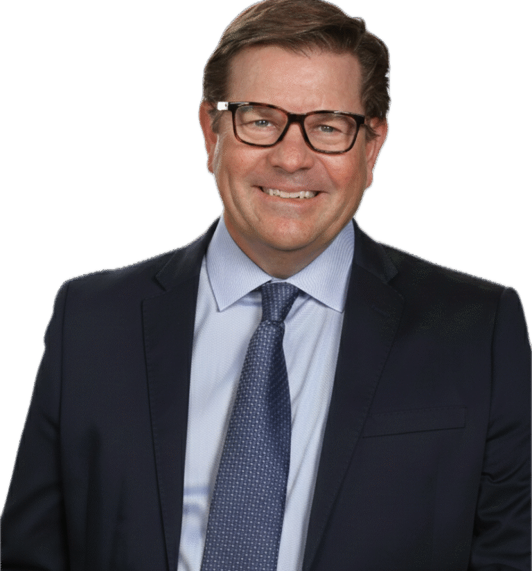 Headshot of Robert Granger, an independent insurance agent in Orange County, wearing a suit and glasses.
